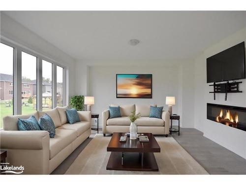 32 Simona Avenue, Wasaga Beach, ON - Indoor Photo Showing Living Room With Fireplace