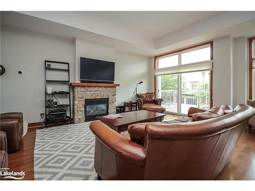 7-104 Farm Gate Road, The Blue Mountains, ON - Indoor Photo Showing Living Room With Fireplace