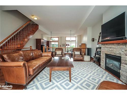 7-104 Farm Gate Road, The Blue Mountains, ON - Indoor Photo Showing Living Room With Fireplace