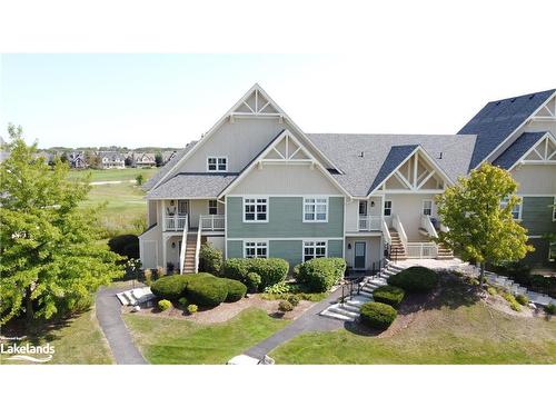 125-125 Fairway Court, The Blue Mountains, ON - Outdoor With Facade