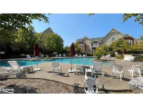 125-125 Fairway Court, The Blue Mountains, ON - Outdoor With In Ground Pool With Backyard