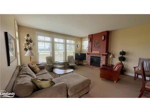 125-125 Fairway Court, The Blue Mountains, ON - Indoor Photo Showing Living Room With Fireplace