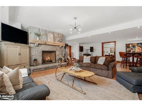 1074 Tally Ho Winter Park Road, Lake Of Bays, ON - Indoor Photo Showing Living Room With Fireplace