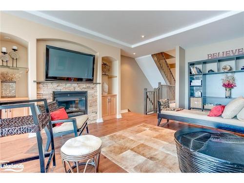 4-209707 26 Highway, The Blue Mountains, ON - Indoor Photo Showing Living Room With Fireplace