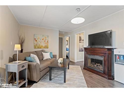 1658 Peninsula Point Road, Severn Twp, ON - Indoor Photo Showing Living Room With Fireplace