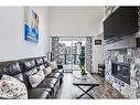 304-10 Beausoleil Lane, The Blue Mountains, ON  - Indoor Photo Showing Living Room With Fireplace 