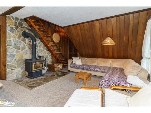 1363 West Oxbow Lake Road, Dwight, ON - Indoor With Fireplace