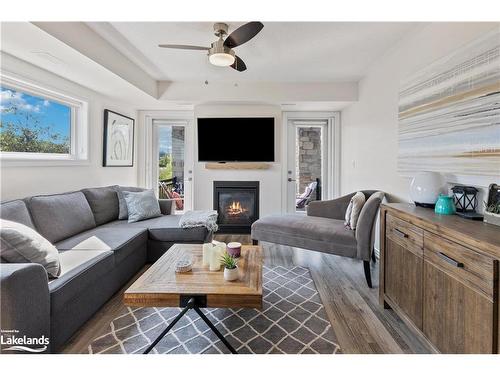 101-4 Anchorage Crescent, Collingwood, ON - Indoor Photo Showing Living Room With Fireplace