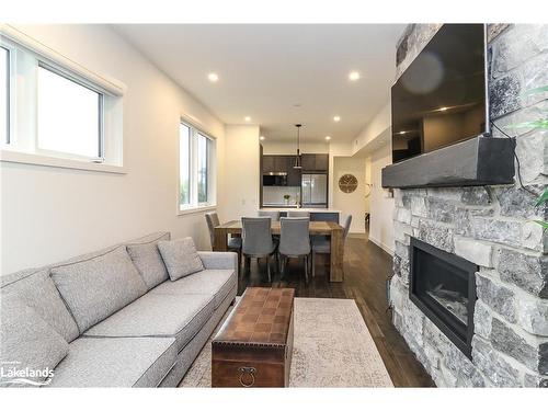 107-12 Beausoleil Lane, The Blue Mountains, ON - Indoor Photo Showing Living Room With Fireplace