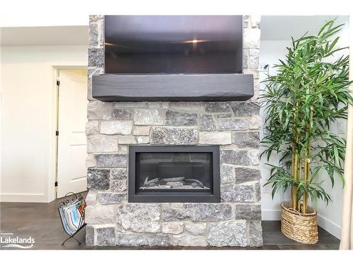 107-12 Beausoleil Lane, The Blue Mountains, ON - Indoor Photo Showing Living Room With Fireplace