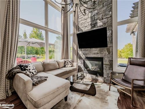 34 Carrick Trail, Gravenhurst, ON - Indoor Photo Showing Living Room With Fireplace