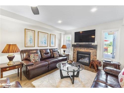 50 Masters Crescent, Port Severn, ON - Indoor Photo Showing Living Room With Fireplace