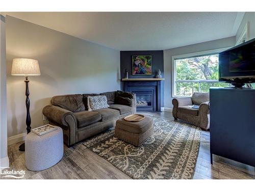 141 Wasaga Sands Drive, Wasaga Beach, ON - Indoor Photo Showing Living Room With Fireplace