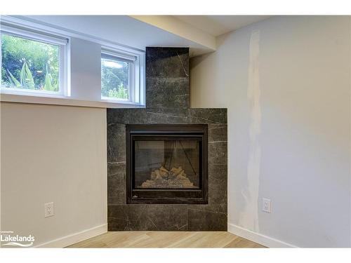 141 Wasaga Sands Drive, Wasaga Beach, ON - Indoor Photo Showing Living Room With Fireplace