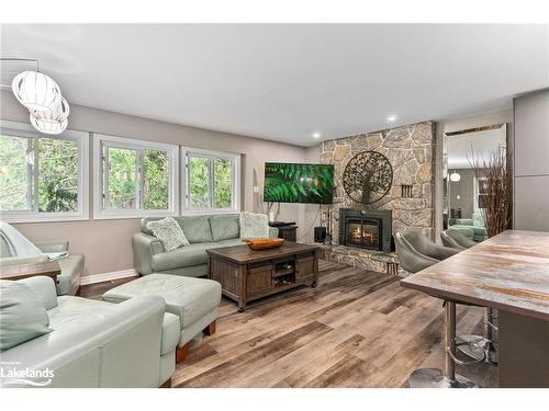 256 Woodland Drive, Huntsville, ON - Indoor Photo Showing Living Room With Fireplace