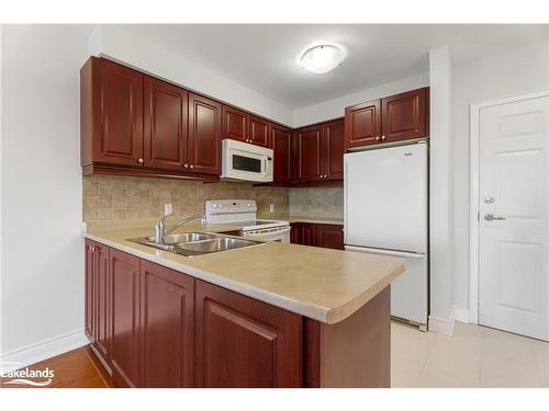 411-91 Raglan Street, Collingwood, ON - Indoor Photo Showing Kitchen With Double Sink