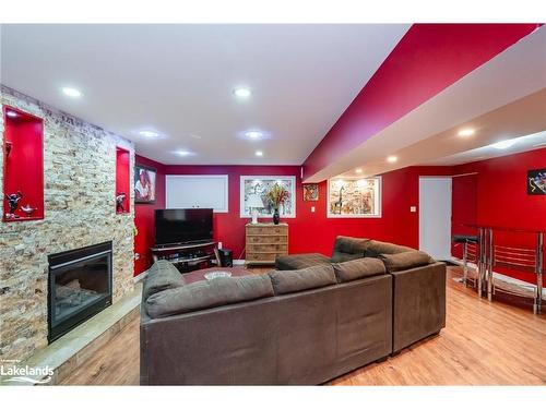 6 Parklane Court, Tiny, ON - Indoor Photo Showing Living Room With Fireplace