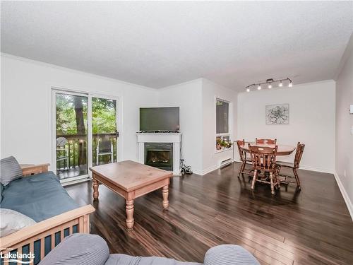 97 Southbank Drive, Bracebridge, ON - Indoor Photo Showing Living Room With Fireplace