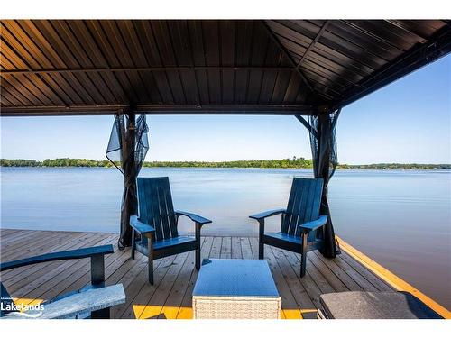 1059 Torpitt Road, Severn Bridge, ON - Outdoor With Body Of Water With Deck Patio Veranda With View With Exterior