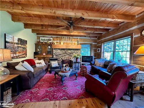 115 Tyrol Ave, The Blue Mountains, ON - Indoor Photo Showing Living Room With Fireplace