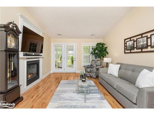 15 Chestnut Lane, Wasaga Beach, ON - Indoor Photo Showing Living Room With Fireplace