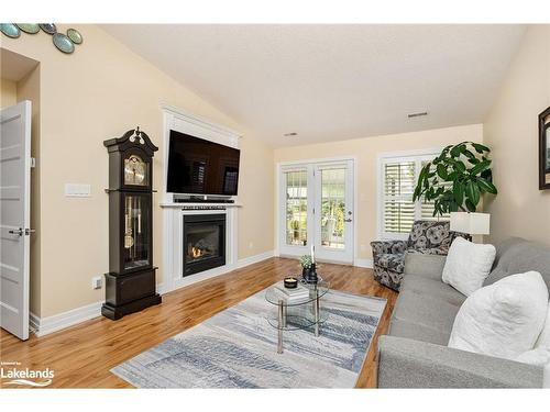 15 Chestnut Lane, Wasaga Beach, ON - Indoor Photo Showing Living Room With Fireplace