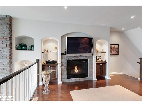 10-209707 26 Highway, The Blue Mountains, ON - Indoor Photo Showing Living Room With Fireplace