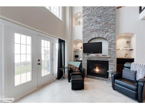 10-209707 26 Highway, The Blue Mountains, ON - Indoor Photo Showing Living Room With Fireplace