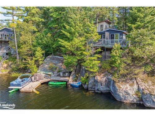 1118 Tomingas Road, Gravenhurst, ON - Outdoor With Body Of Water With Deck Patio Veranda