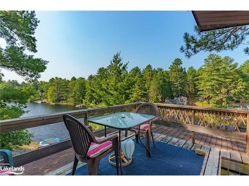 1118 Tomingas Road, Gravenhurst, ON - Outdoor With Body Of Water With Deck Patio Veranda