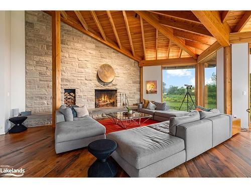 827834 Mulmur-Nottawasaga Townline, Creemore, ON - Indoor Photo Showing Living Room With Fireplace