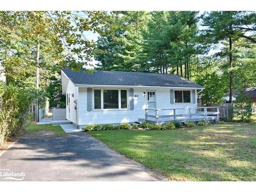 60 Sunnidale River Road, Wasaga Beach, ON - Outdoor With Deck Patio Veranda With Facade