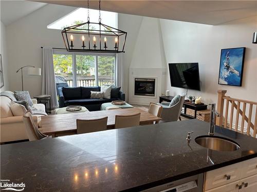 11-110 Kellie'S Way, The Blue Mountains, ON - Indoor Photo Showing Dining Room With Fireplace