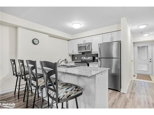 104-4 Anchorage Crescent, Collingwood, ON - Indoor Photo Showing Kitchen With Stainless Steel Kitchen With Double Sink