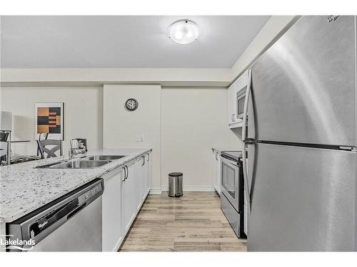 104-4 Anchorage Crescent, Collingwood, ON - Indoor Photo Showing Kitchen With Stainless Steel Kitchen With Double Sink