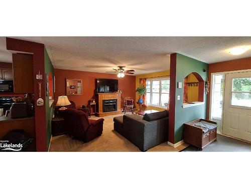 11 Herons Hill, Bracebridge, ON - Indoor Photo Showing Other Room With Fireplace