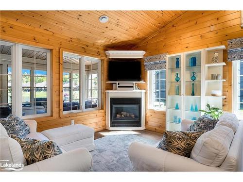 23 Cabin Crescent, Wasaga Beach, ON - Indoor Photo Showing Living Room With Fireplace