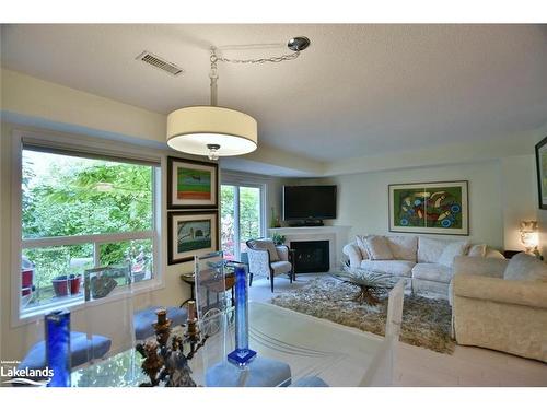 103 Ellen Lane, Collingwood, ON - Indoor Photo Showing Living Room With Fireplace