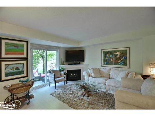 103 Ellen Lane, Collingwood, ON - Indoor Photo Showing Living Room With Fireplace