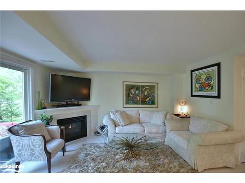 103 Ellen Lane, Collingwood, ON - Indoor Photo Showing Living Room With Fireplace