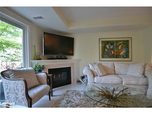 103 Ellen Lane, Collingwood, ON - Indoor Photo Showing Living Room With Fireplace