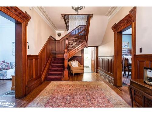 18 Amelia Street, Springwater, ON - Indoor Photo Showing Other Room With Fireplace