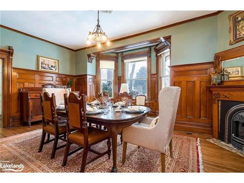 18 Amelia Street, Springwater, ON - Indoor Photo Showing Dining Room With Fireplace