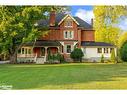 18 Amelia Street, Springwater, ON  - Outdoor With Facade 