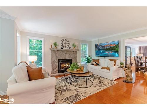 24 Birchwood Drive, Huntsville, ON - Indoor Photo Showing Living Room With Fireplace