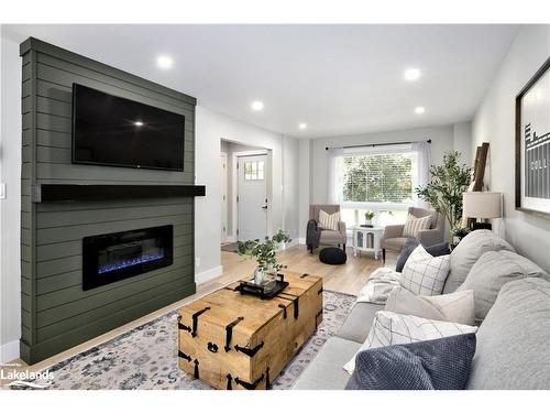 18 Godden Street, Collingwood, ON - Indoor Photo Showing Living Room With Fireplace