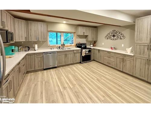 38 Foliage Drive, Tiny, ON - Indoor Photo Showing Kitchen With Double Sink