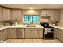 38 Foliage Drive, Tiny, ON  - Indoor Photo Showing Kitchen With Double Sink 