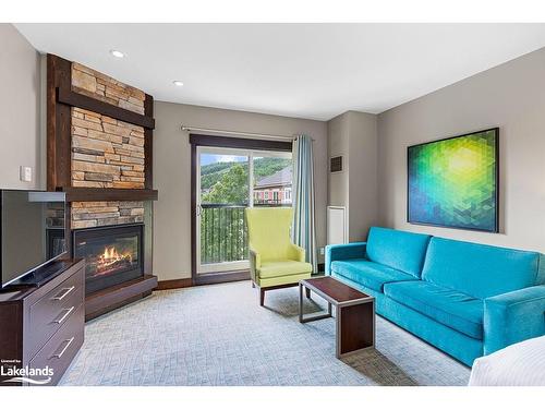 428-190 Jozo Weider Boulevard, The Blue Mountains, ON - Indoor Photo Showing Living Room With Fireplace