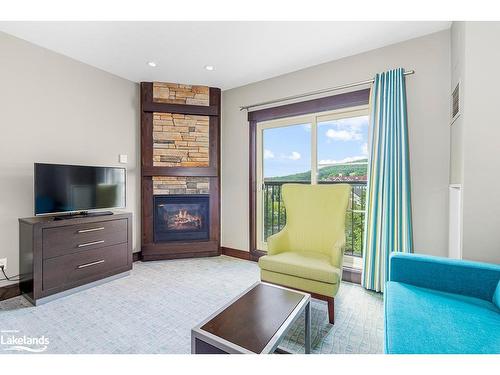 428-190 Jozo Weider Boulevard, The Blue Mountains, ON - Indoor Photo Showing Living Room With Fireplace